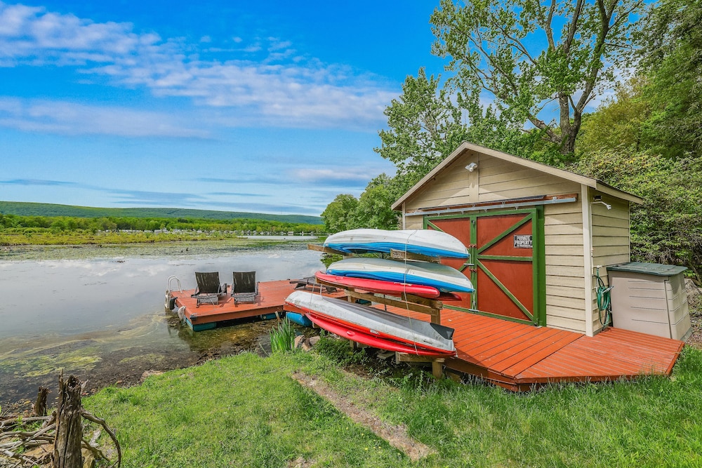 Lakefront A-frame Dock Kayaks Fire Place