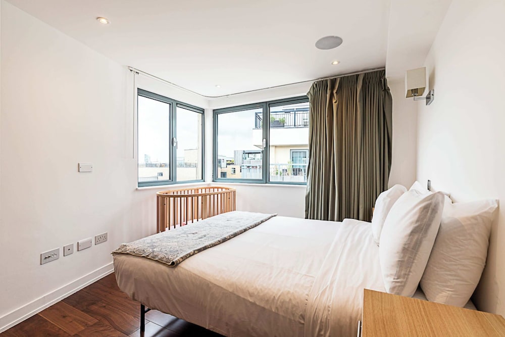 Modern Haven With Terrace View & Urban Charm