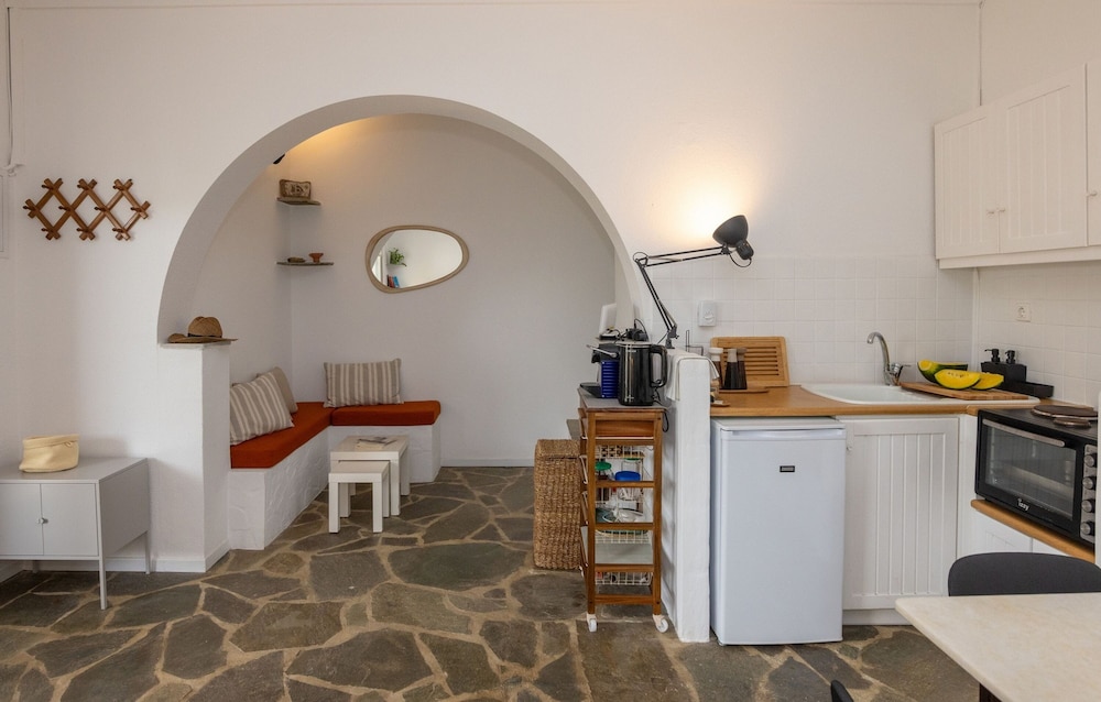 By The Stone Tinos