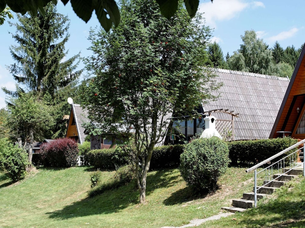 Wooden Chalet With Terrace Near a Swimming Lake