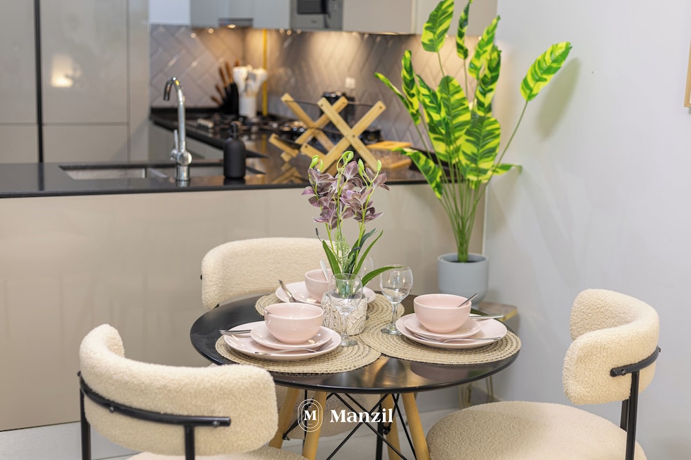 Manzil-Stylish 1BR with Maid room in JVC