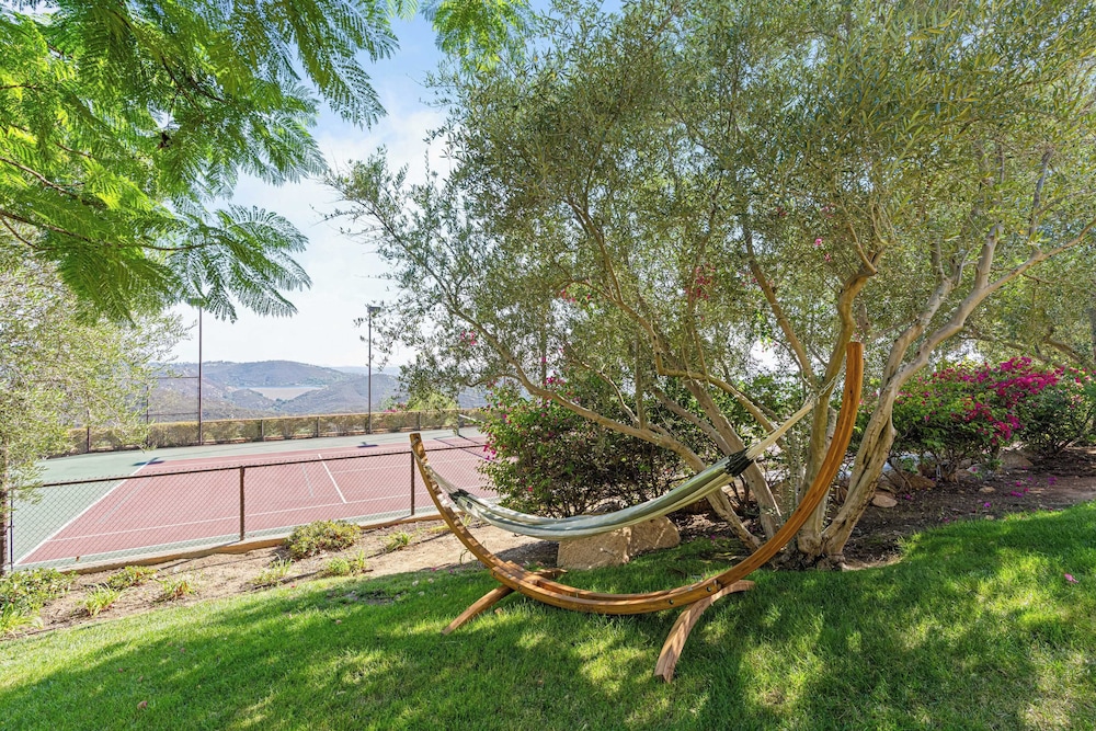 Infinity Pool, Theater, Pickleball + 360 Views Near Lake Poway Sunset Point Estate by Avantstay