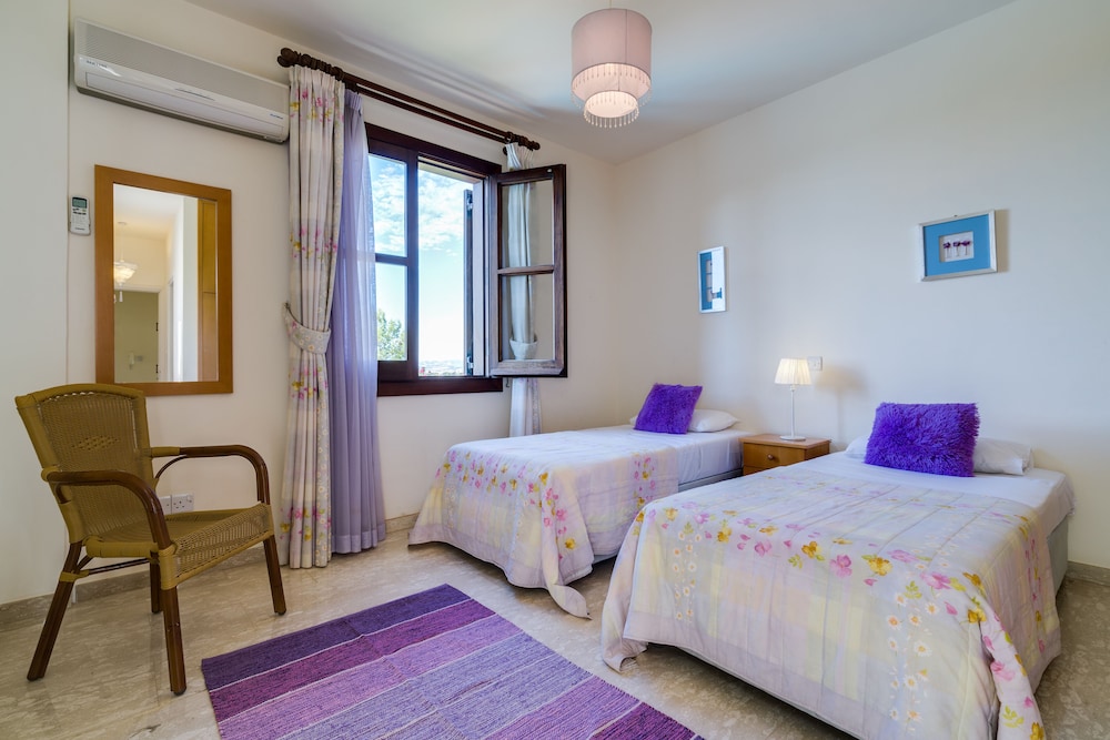 3 bedroom Villa Anarita 64 with private L-shaped pool, beautiful gardens, near resort village square view 4