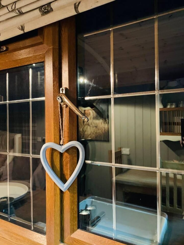 Cute and Cosy Shepard hut With Wood Fuel hot tub view 4