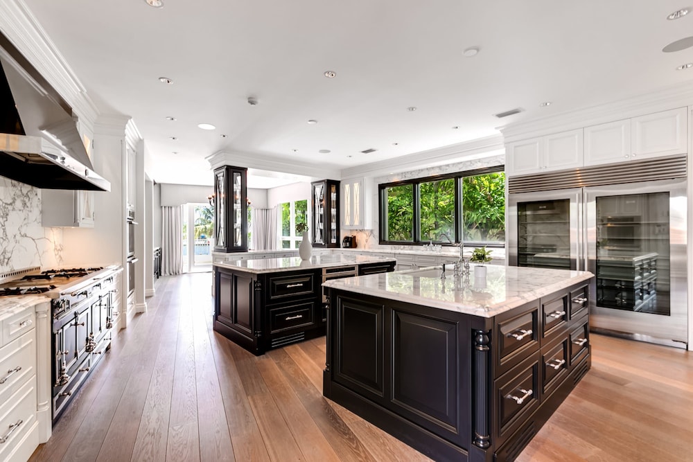 Waterfront Mansion With Game Room Gym Media Room and Guest House