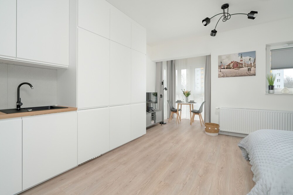 Minimalist Studios in Poznań by Renters