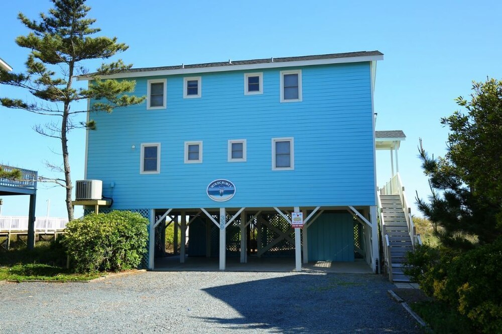 Windchimes 4 Bedroom Home by RedAwning