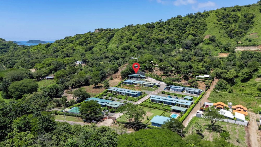 Modern Home with Lush Mountain Views and Spectacular Shaded Terrace in Private Gated Community
