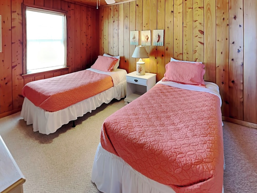 A Charm of Finches by Topsail Realty