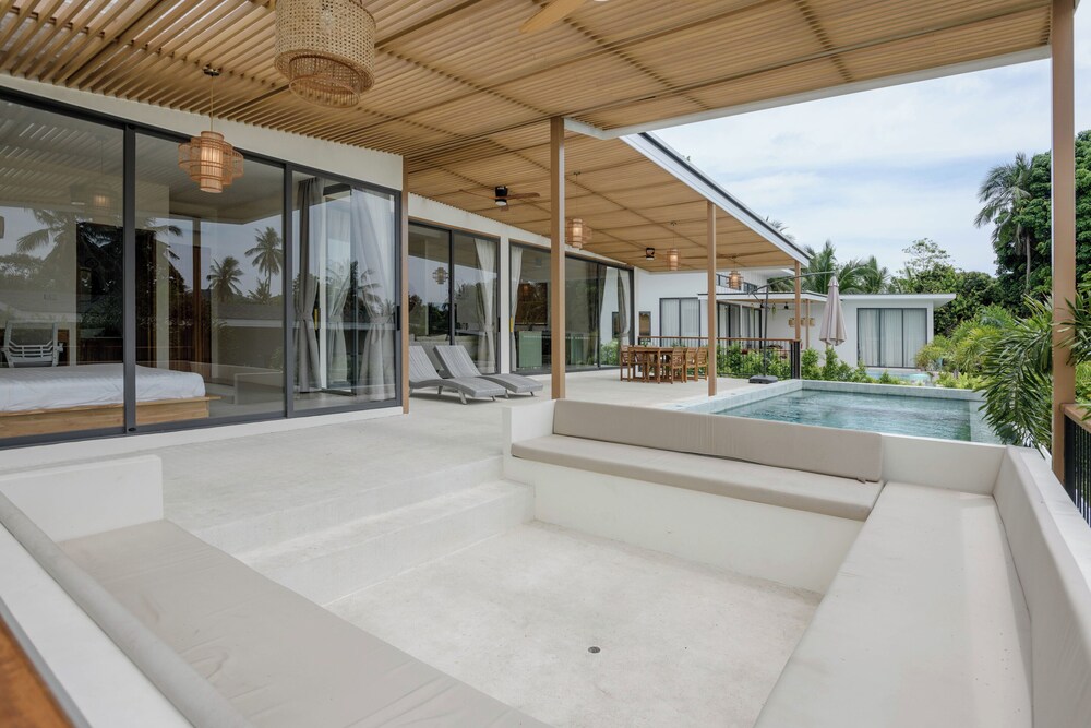 Tropical Poolside Retreat by Sea N' Rent