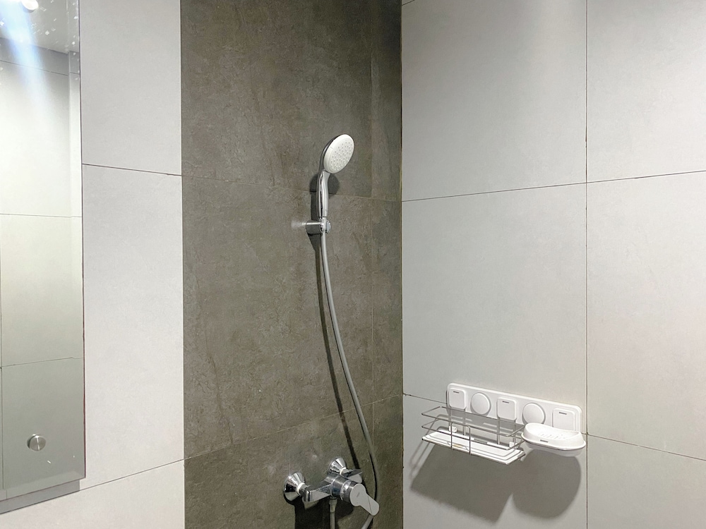 White Toned Studio At Lrt City Bekasi Apartment