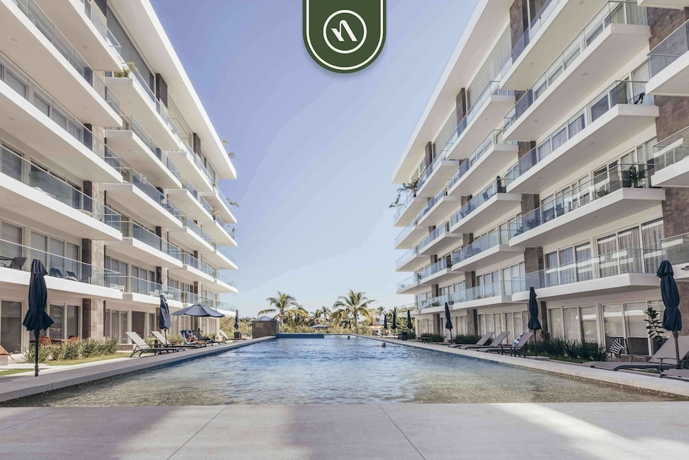 New 2 BR Condo One Street From Beach - Pool - Gym