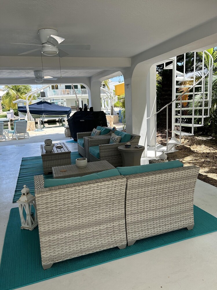 Delightful Vacation Home Located In The Popular Islamorada Neighborhood Of Port Antigua. 3 Bedroom Home by RedAwning