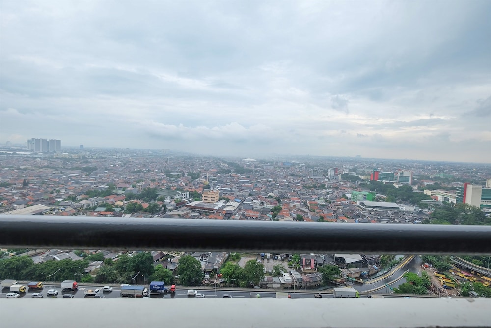 2 Bedrooms at Green Pramuka City Apartment By Travelio