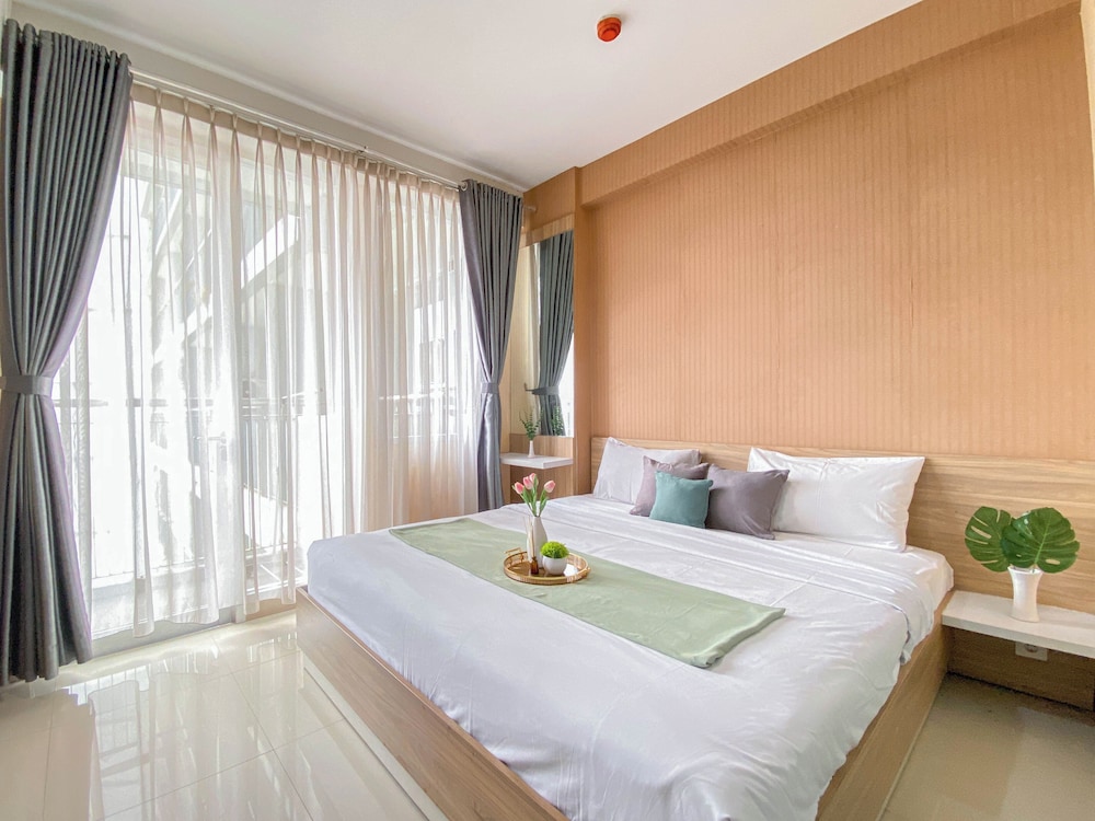 Homey and Comfortable 1BR Apartment at Dago Suites