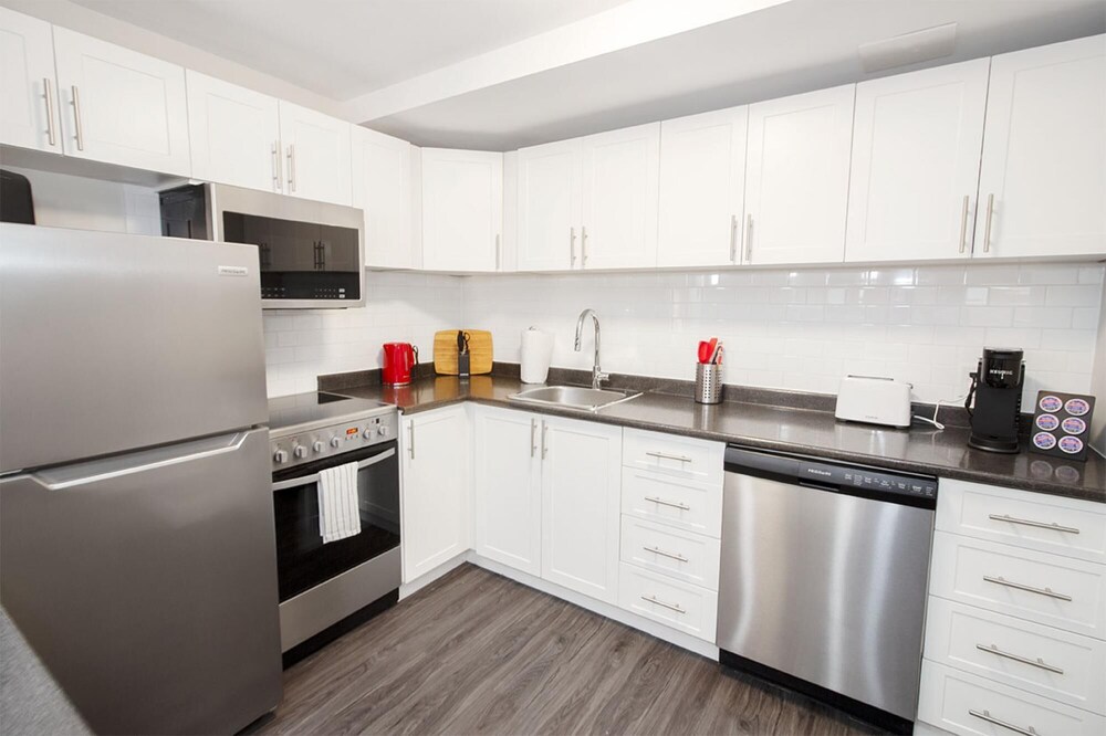 One Bedroom Suite With Patio Laundry and Parking view 3