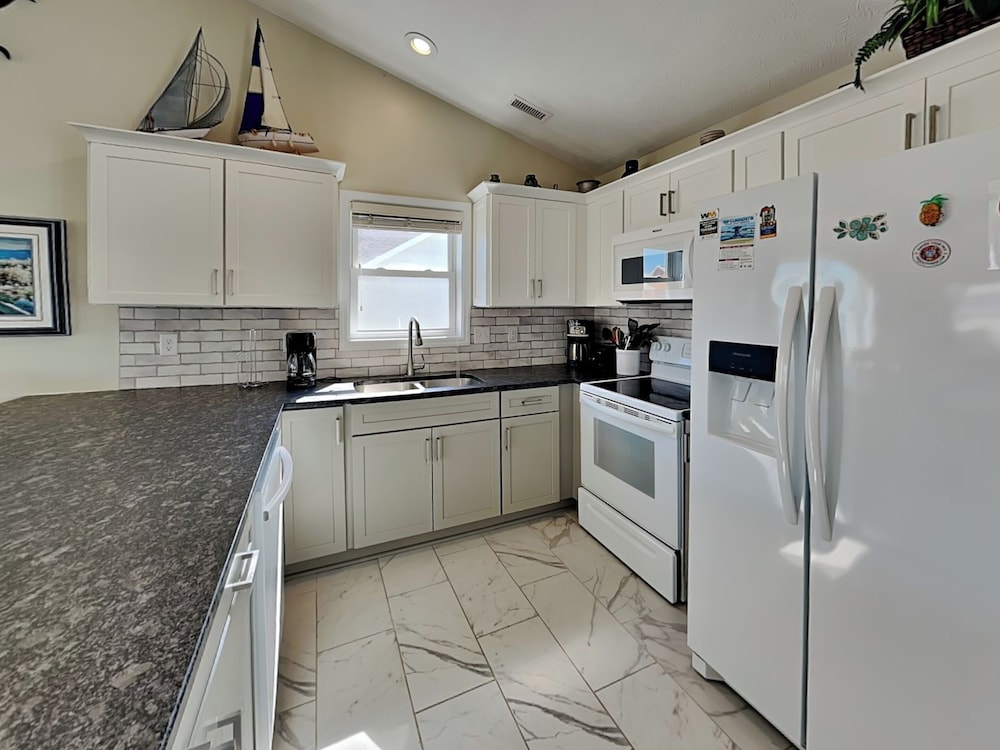 Song Of The Sea by Topsail Realty