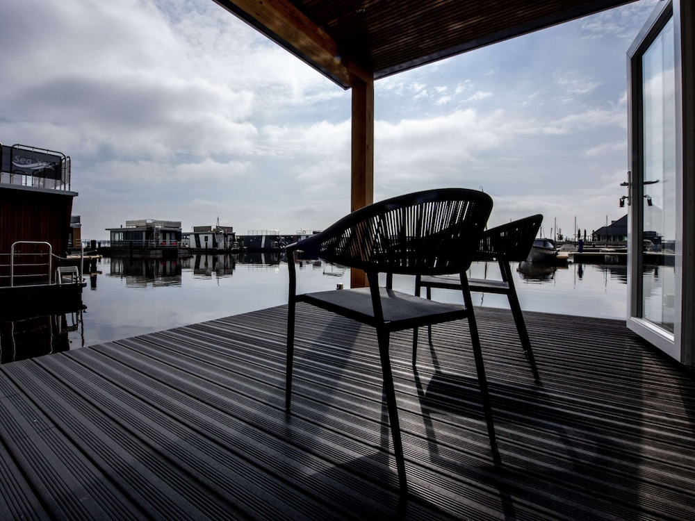 Modern Houseboat With View of the Lake