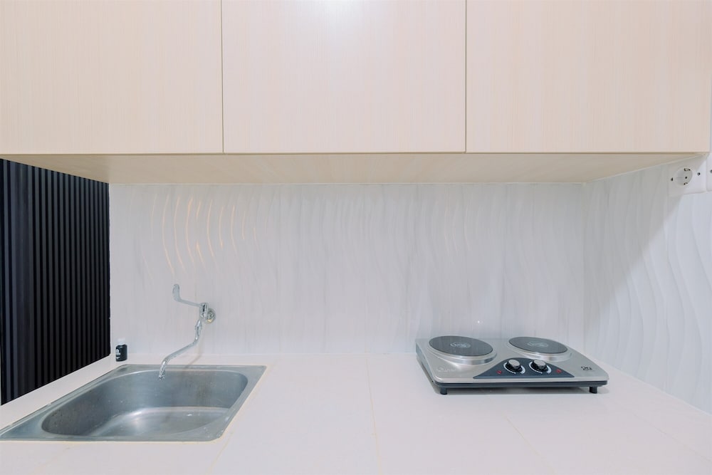 Restful and Modern 2BR at Sentul Tower Apartment