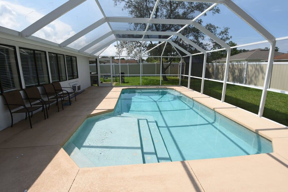 Hidden Oasis Spacious Home With Salt Water Heated Pool Hot Tub Fenced Yard Pets are Welcome
