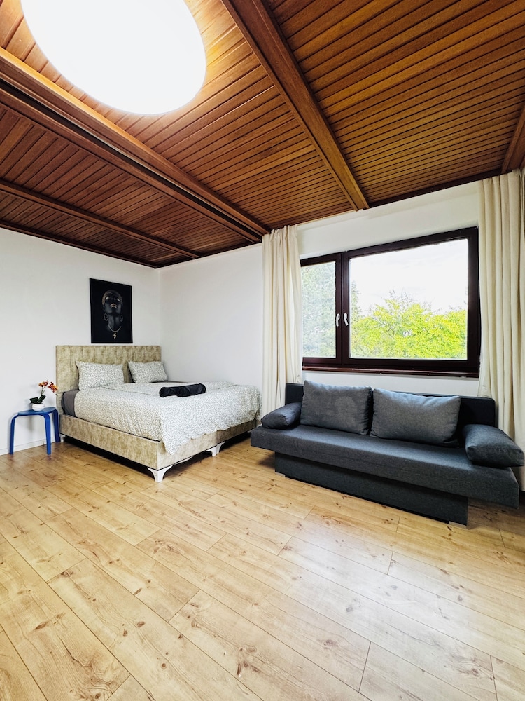 Central 8BR Stay with Garden and Terrace