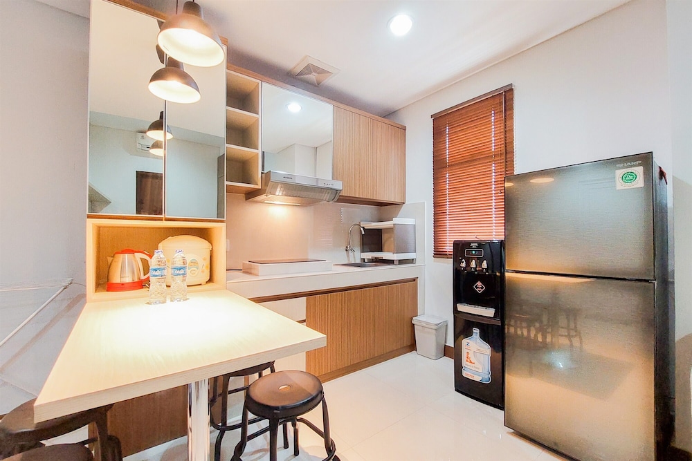 Spacious and Homey 2BR at Springwood Residence Tangerang Apartment