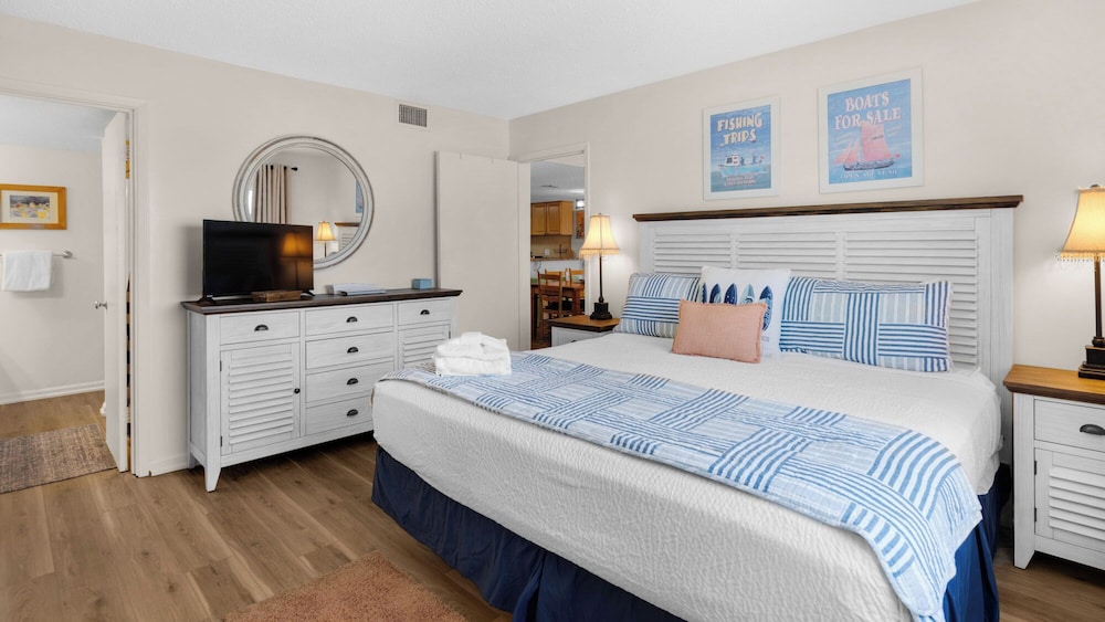 Beachfront Charm Meets Lake Life + Free Tickets: Dolphin Cruise & More!