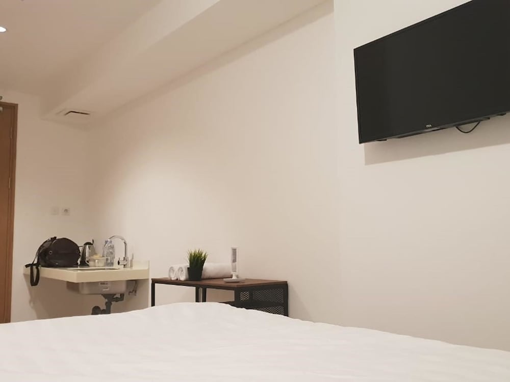 Alpine Room at TreePark City Apartement