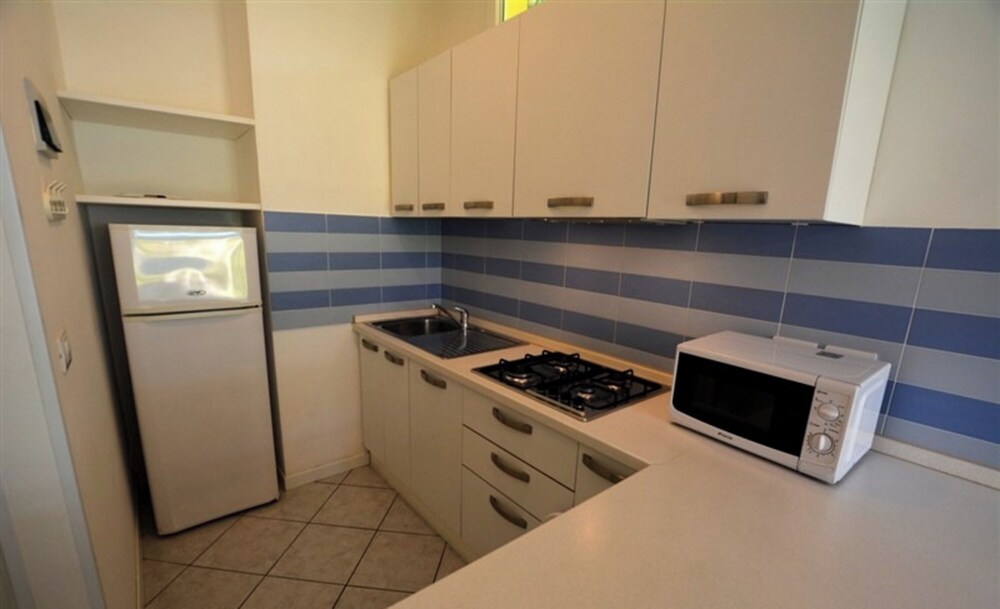 Semi Detached Villa With Private Fenced Garden in Lignano Pineta