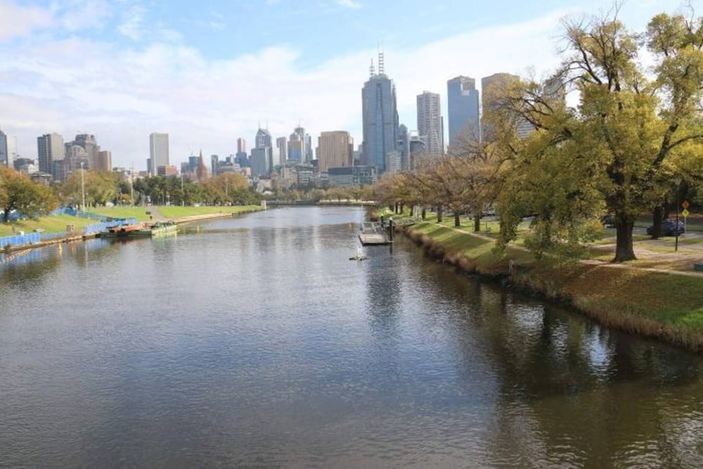 Unwind in Style at Melbourne's Historic Art Deco Apartment With Pool Gym Carpark