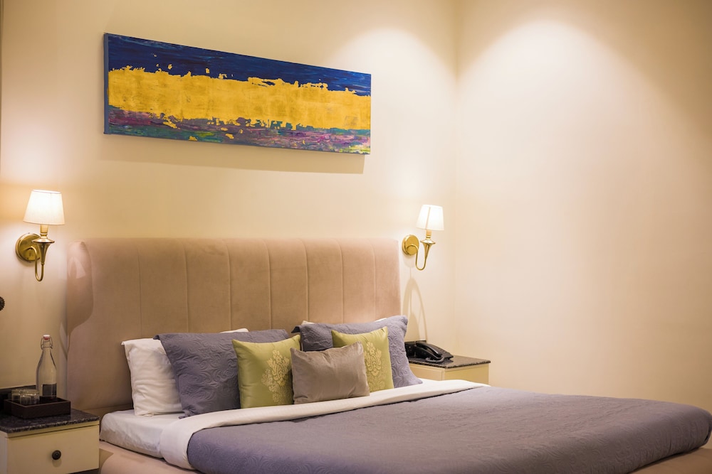 ELIVAAS Ibiza Luxe 4-BHK Farmhouse