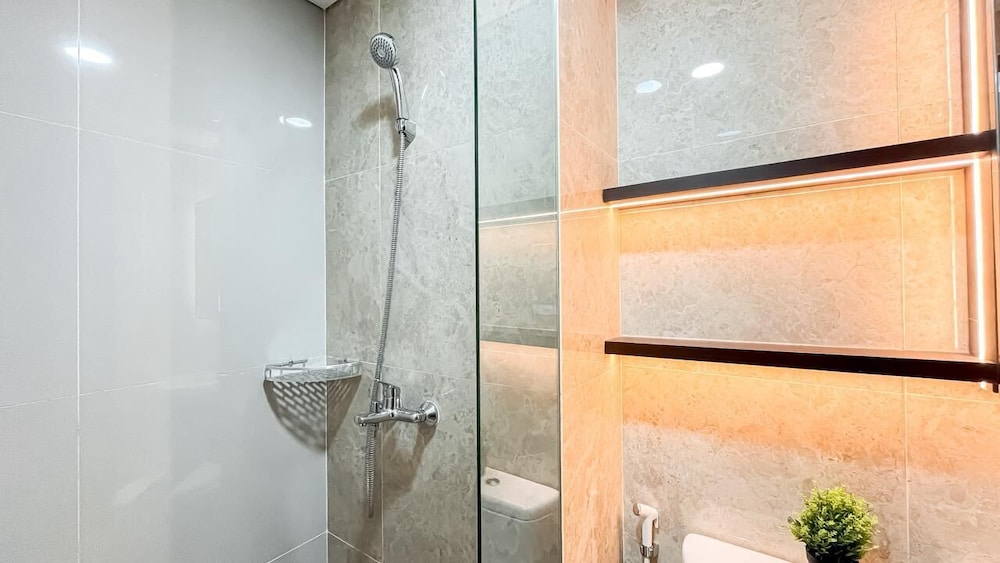 Earth Tone Studio Apartment At Transpark Bintaro