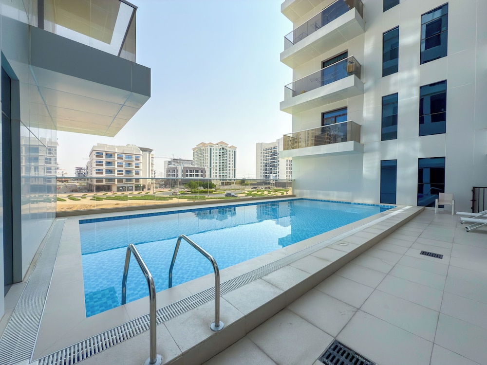 Calm Balcony Apartment with Pool Access