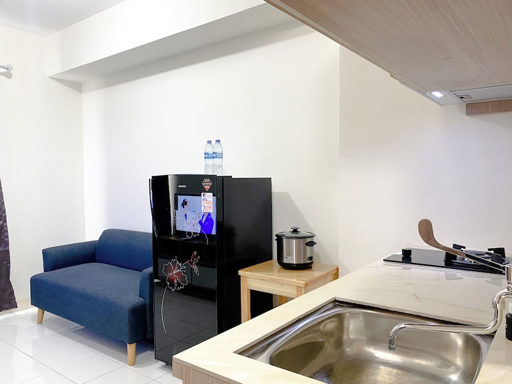 Warm and Homey 2BR at Podomoro Golf View Apartment