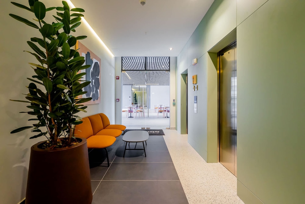 w Elegant 2BR Apartment in the Heart of Centriqo