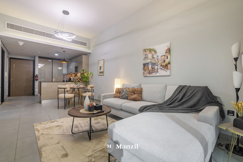 Manzil-Stylish 1BR with Maid room in JVC