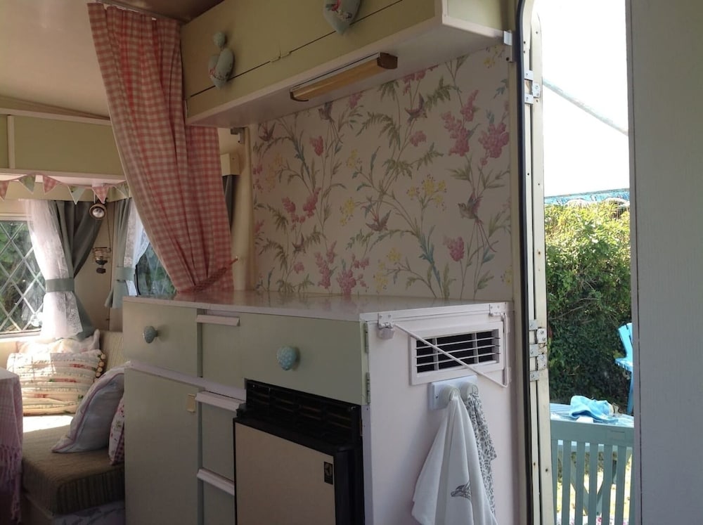 Kitty Unique 60s Caravan set in Pretty Garden view 3