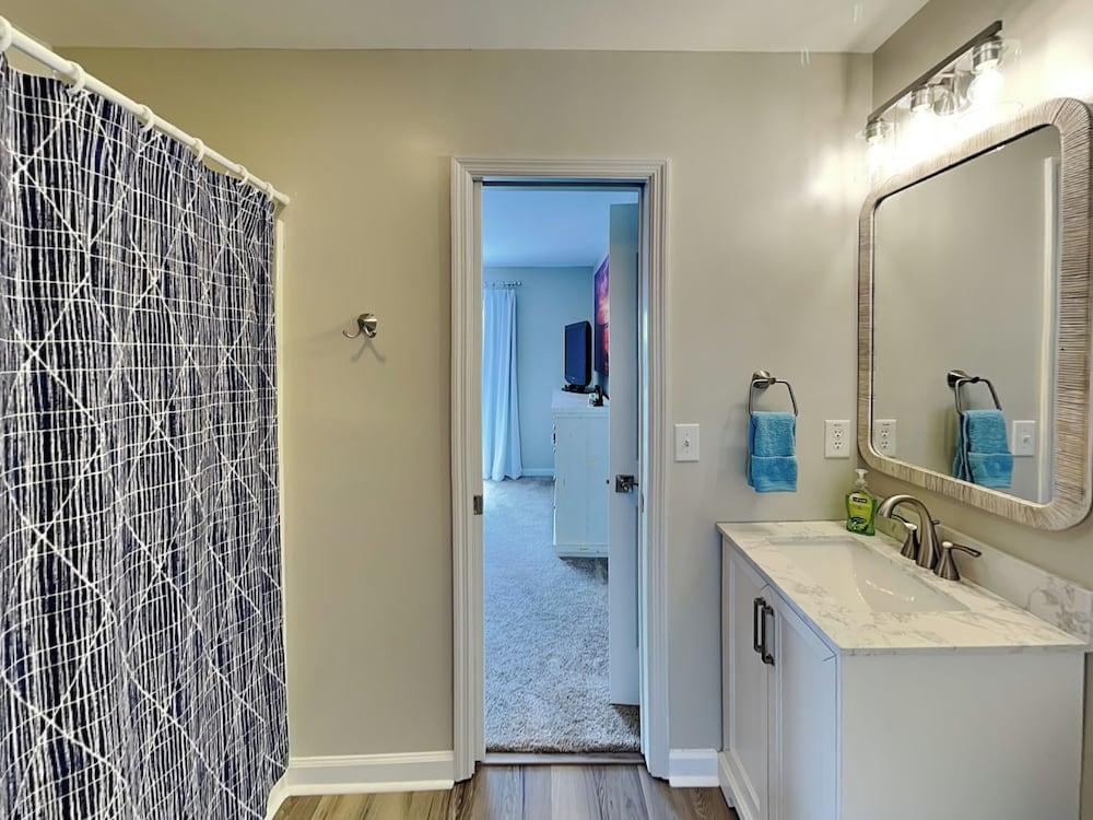 Blue Me A Wave by Topsail Realty
