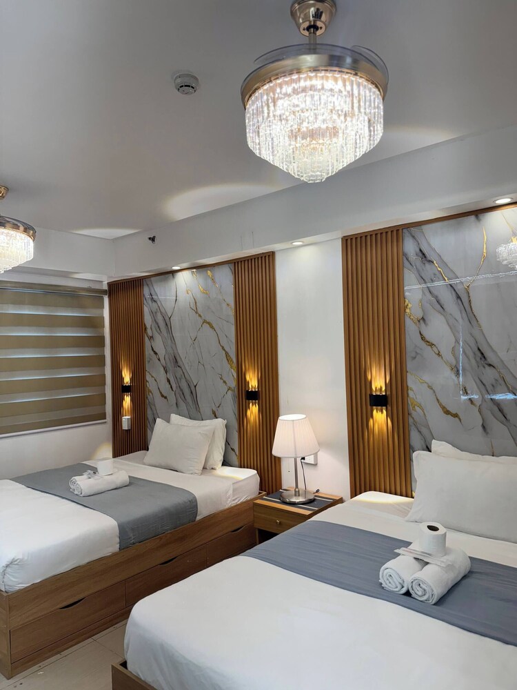 Relax in Pasay City's Best Kept Secret - Spacious Condo With Garden View