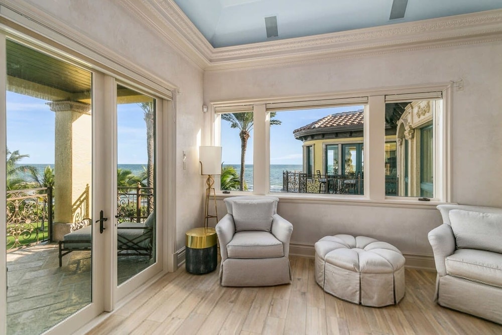 Luxurious 3-story Estate With Gym Pool Slide Private Beach and Lighthouse Views