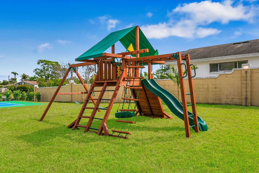 Waterfront Pool Pickleball Court Game Room