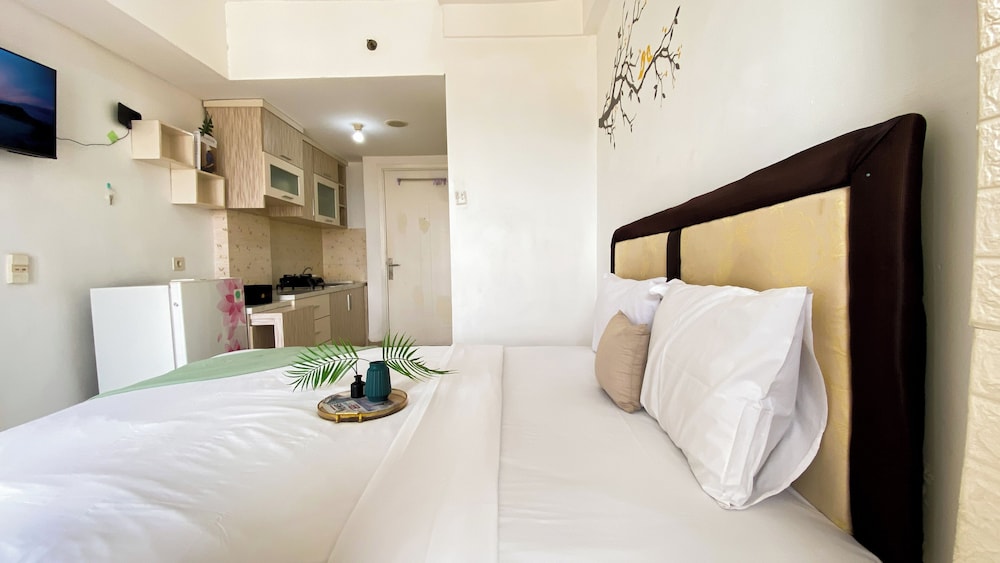 Homey And Cozy Living Studio At Poris 88 Apartment