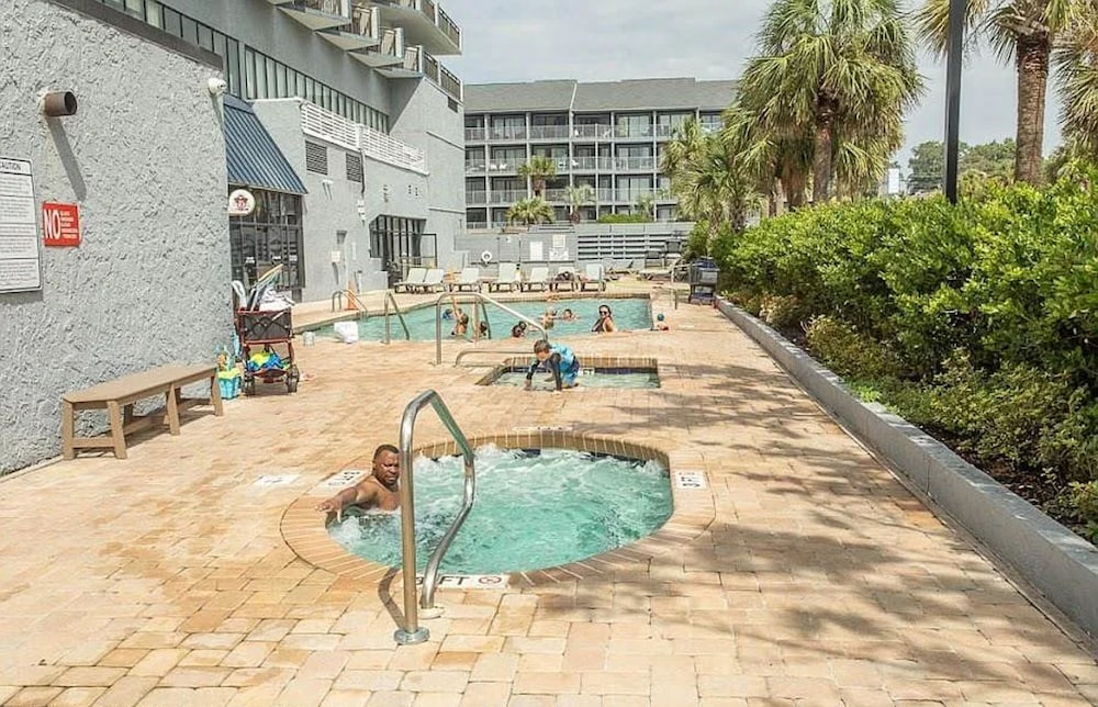 Beachfront Haven 1BR Condo with Balcony