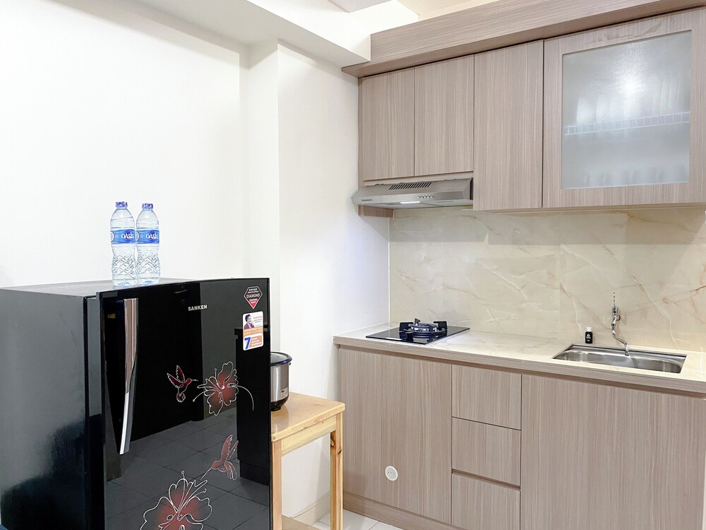 Warm and Homey 2BR at Podomoro Golf View Apartment