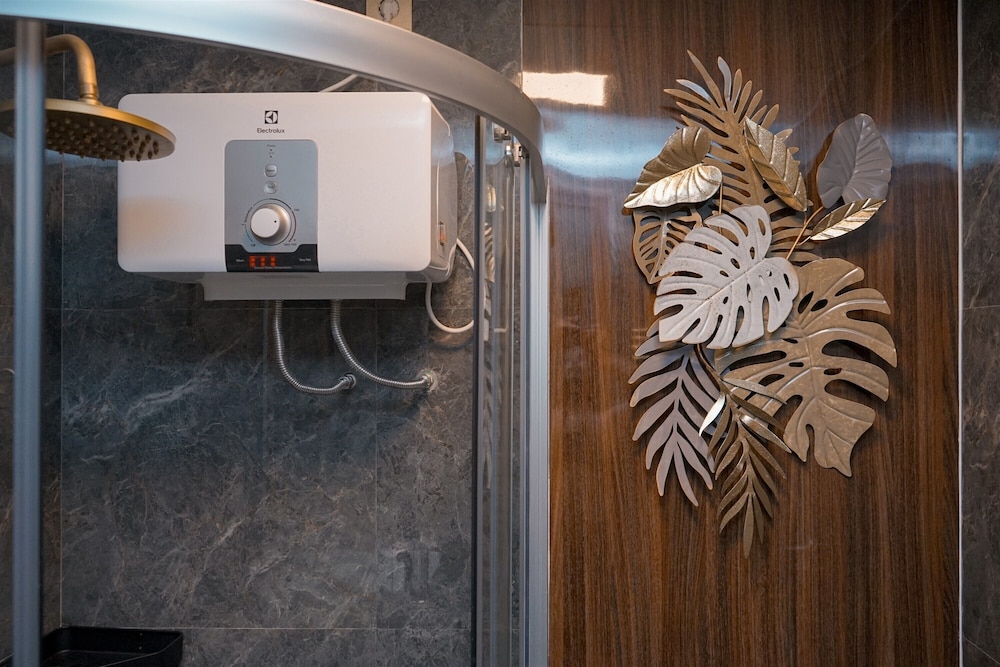 Warm Living 3BR at Sky House BSD Apartment