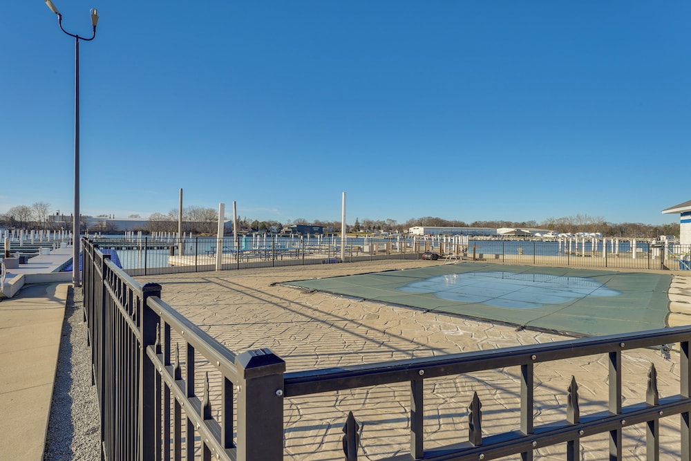 Marina, Pool & Balcony: Modern Spring Lake Condo