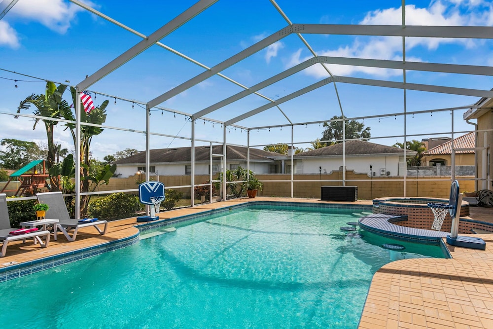 Waterfront Pool Pickleball Court Game Room
