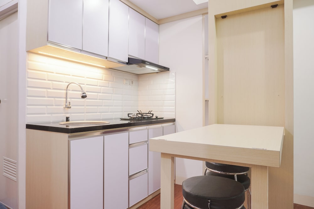Pleasurable 2BR at Podomoro Golf View Apartment near Tol Cimanggis