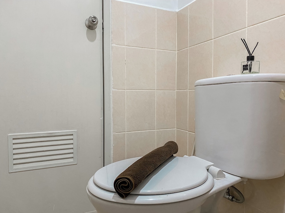 Warm and Homey Studio at Podomoro Golf View Apartment