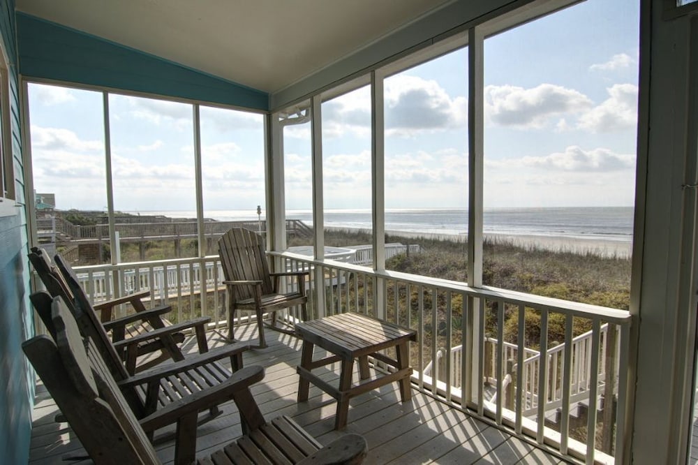 Windchimes 4 Bedroom Home by RedAwning